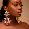 LaBoss Luxe Crystal Flower Chandelier Ea

Make a grand entrance with our LaBoss Luxe Crystal Flower Chandelier Earrings, designed to steal the spotlight.
Whether you’re hitting the pageant stage, dressing up for a formal event, or simply embracing your in
